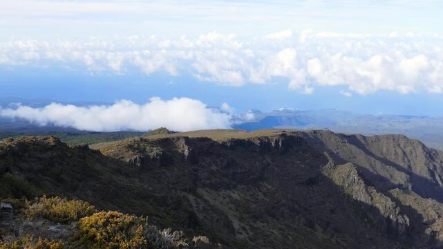 Along highway 378 near an Overlook in Haleakalā National Park. Around 8,800 feet above sea level over the cloud line, up the Haleakala volcano. On the island of Maui, Hawaii.