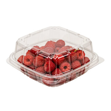 Fresh raspberries in a clear plastic container isolated on a transparent background