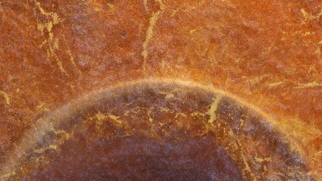 Mixing alcohol ink fragments in close-up view