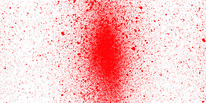 Abstract red spray paint texture on white background with central particle dispersion.
