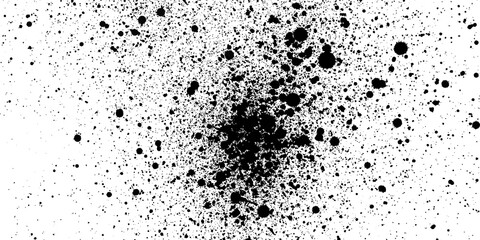 Obraz premium Black ink splatter texture on white background for artistic graphic design projects