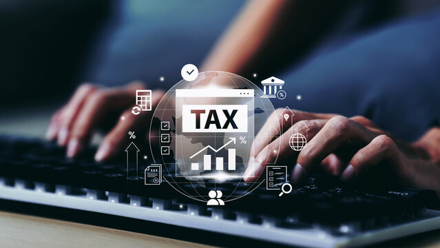 ิีImages of hands using computer for online tax calculation and digital accounting with financial technology interface