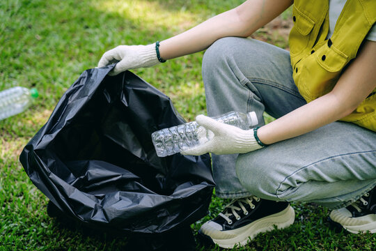 Eco volunteer collects plastic bottles sustainable recycling eff