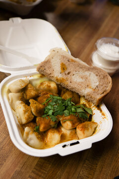 Russian Dumplings with seasoning and rye bread 