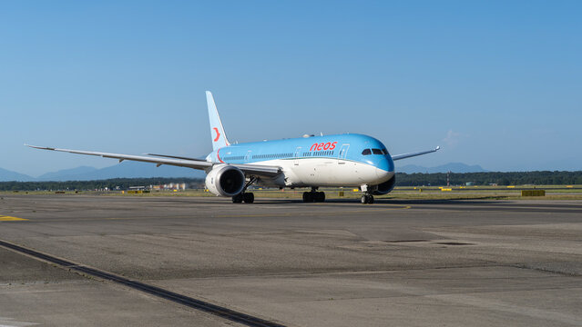 A Neos Boeing 787 Dreamliner is taxiing to the runway at MXP Milano Malpensa international airport
