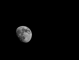 Detailed Gibbous Moon Against Black Sky © Kevin Daugherty