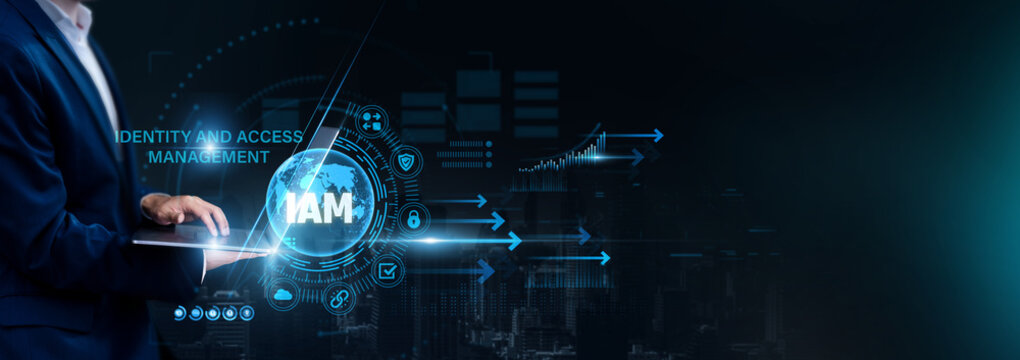 Businessman using laptop for analyzing IAM and global identity data, access control, user authentication, security management, digital protection.