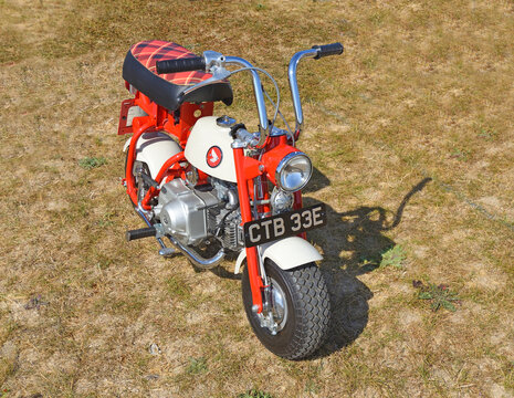 Vintage 1967 Honda Z50M "Monkey Bike" with a red-and-white frame
