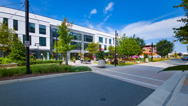Pedestrian crossings connect modern commercial buildings in One Loudoun, Ashburn, Virginia.