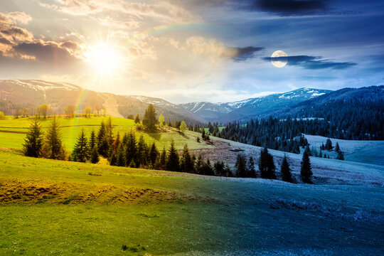 panoramic view of countryside of Ukraine. day meet night. sun and moon over wonderful springtime landscape in Carpathian mountains. grassy field and rolling hills. beautiful rural scenery