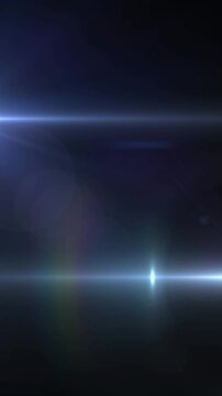 Animation of light trails and spots over black background