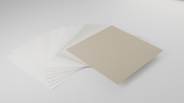 Watercolour and drawing paper sheets fanned out on a white background