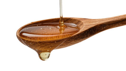 Golden honey dripping from a wooden spoon, isolated on transparent background © Claudia
