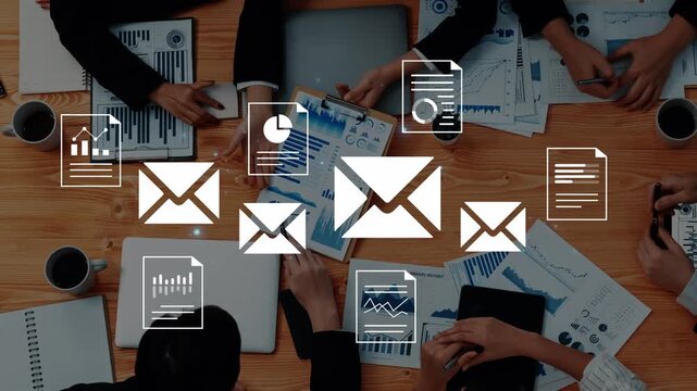 Business Meeting with Documents and Digital Communication Symbols on a Wooden Table Surrounded by Professionals Collaborating in a Modern Workspace Gluon.
