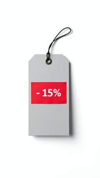 Gray price tag with red label displaying minus fifteen percent discount for retail sale promotion