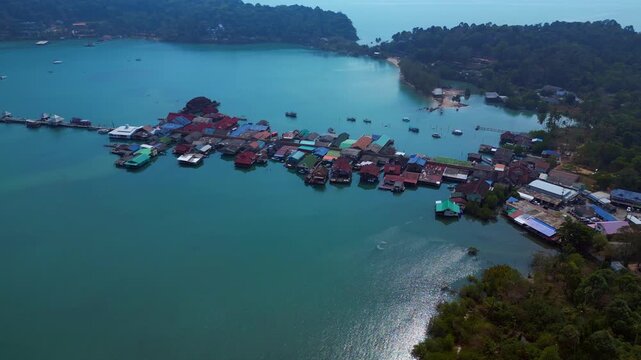 Traditional floating fishing village on stilts bay. Fantastic aerial view drone