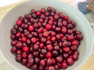 Fresh Ripe Red Cherries in a Bowl Close Up Top View © Mapa