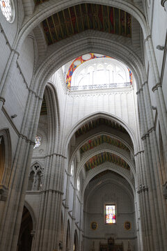 Gothic cathedral interior with high vaulted ceiling and arches