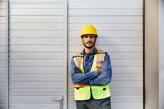 Portrait of confident blue collar worker at work looking at camera.