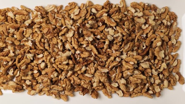 Shelled walnuts on a white background