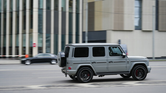 Mercedes Benz G63 AMG captured in motion on a city street, combining iconic luxury SUV design with dynamic urban mobility, performance and contemporary automotive culture