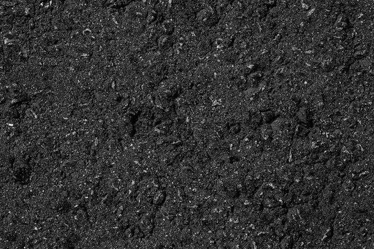 Surface grunge rough of asphalt texture as background. Seamless tarmac dark grey grainy road.
