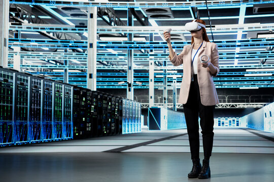 Data center admin using VR headset to upgrade server racks