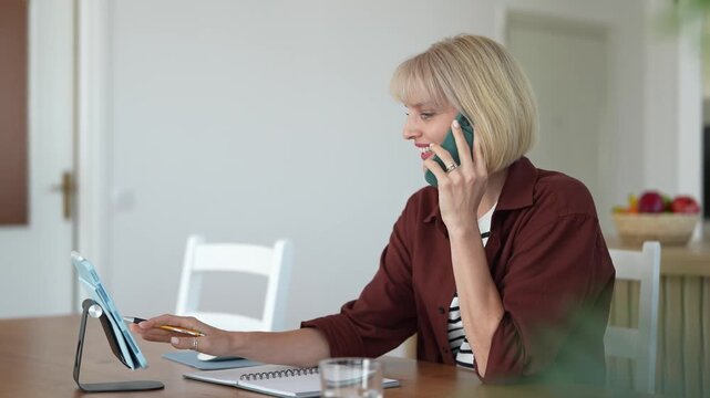 Professional businesswoman multitasking while working from home office