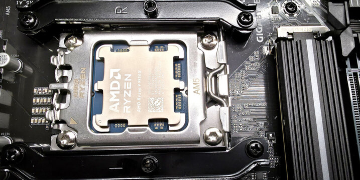 Minsk, Belarus. Jul 15, 2026. Top view of an AMD Ryzen 9 9950X CPU installed in an AM5 socket
