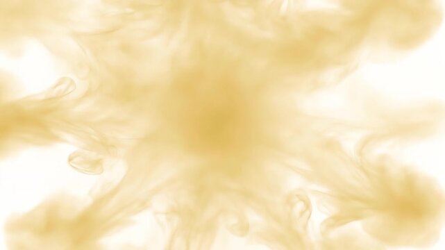 Golden liquid ink swirling in water creating a beautiful abstract explosion pattern for motion graphics and creative background video design