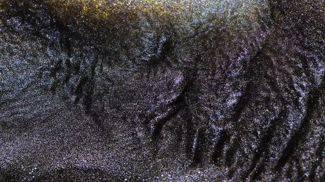 Mixing alcohol ink in macro view creates unique patterns and textures