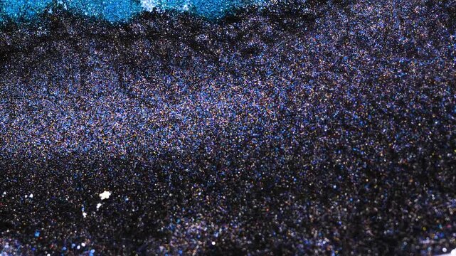 Mixing alcohol ink in close-up view showing colors and textures