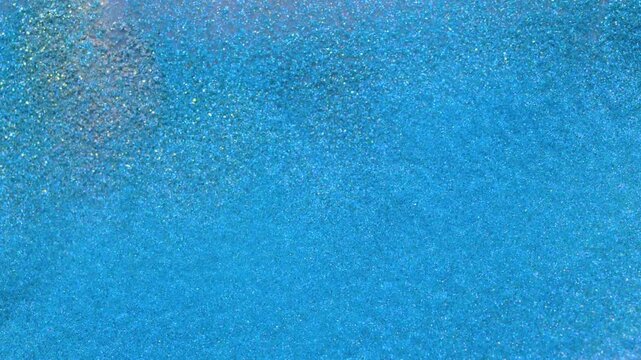 Mixing alcohol ink fragments with vibrant colors and patterns