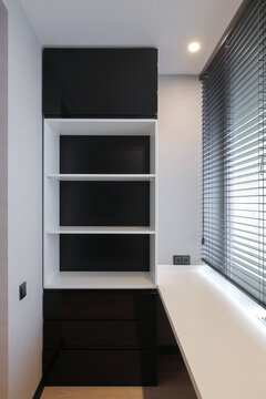 Black and white balcony cabinet