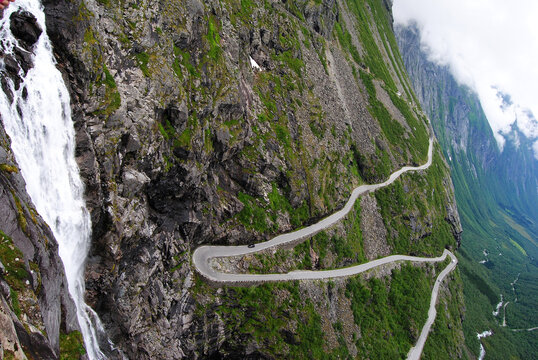 Trollstigen mountain road and Stigfossen waterfall in Norway