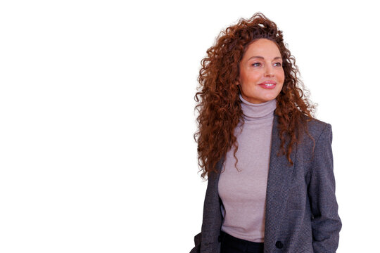 Confident businesswoman with curly hair smiling and looking away, showcasing professionalism and success, transparent background