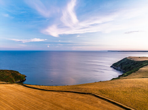 Sunset over Cornwall Fields and Farms from a drone, Polruan, Cornwall, England