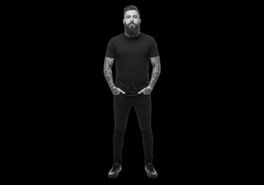 Full body portrait of a bearded man with arm tattoos isolated on transparent background