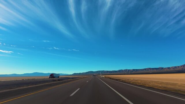 California Desert Highway POV Drive Across Open Mojave Landscape