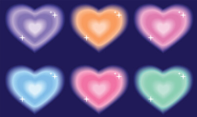 Fototapeta premium six colorful glowing aura gradient heart shapes with sparkles on dark blue background