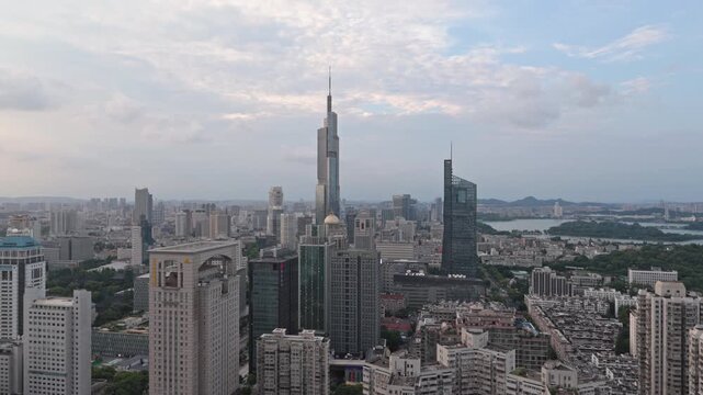 Nanjing city skyline under a softly clouded evening sky
