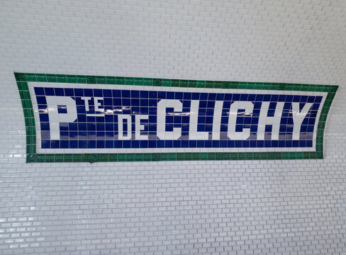 PARIS, FRANCE - SEPTEMBER 1, 2026 - Paris Metro sign for Porte de Clichy station featuring blue and green tiles
