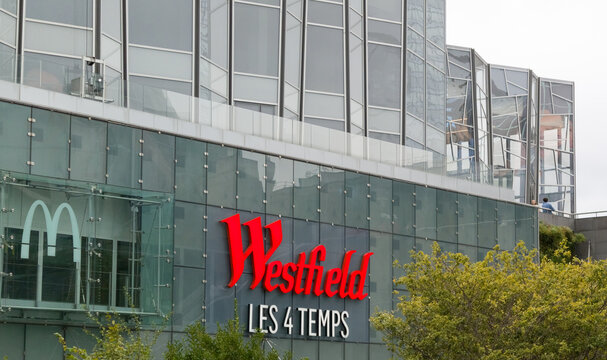 PARIS, FRANCE - SEPTEMBER 1, 2026 - Westfield Les 4 Temps shopping mall exterior with modern glass architecture and trees