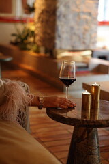 Glass of Red Wine on a Table © Maria Rasin