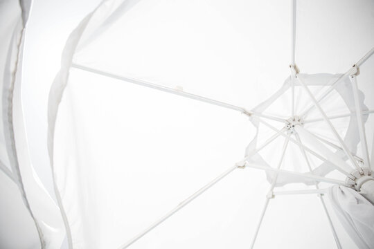 View from under white beach umbrella