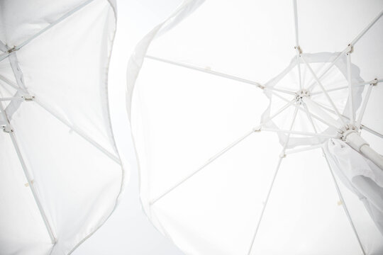 View from under white beach umbrella