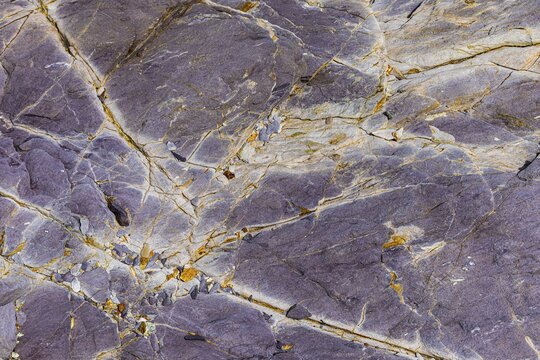 Coloured, ferrous mineral rocks on the beach of Topinetti, near Rio Marina, Elba, Tuscan Archipelago, Tuscany, Italy