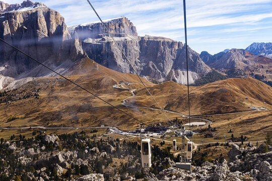 Cable car from the Sella Pass to the Sassolungo Pass, Sella Pass and Sella massif in the background, Dolomites, South Tyrol, Italy