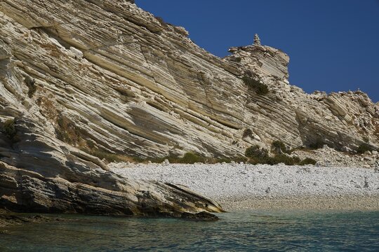 Rock formations over a calm turquoise sea with a clear sky above, White Cliffs, White Beach, Makri Aspronisi Island, Natura 2000 area, boat trip, Aspronisi, Lipsi, Dodecanese, Greek Islands, Greece