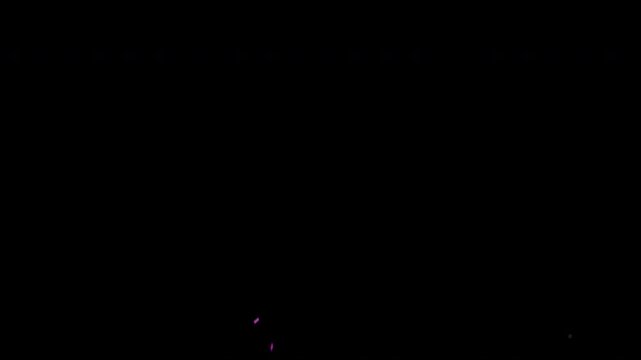 Colorful confetti falling slowly against a solid black background